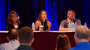 Stacey Pape (c) speaks to the group with Veronica Sutyak and Ryan Dunn